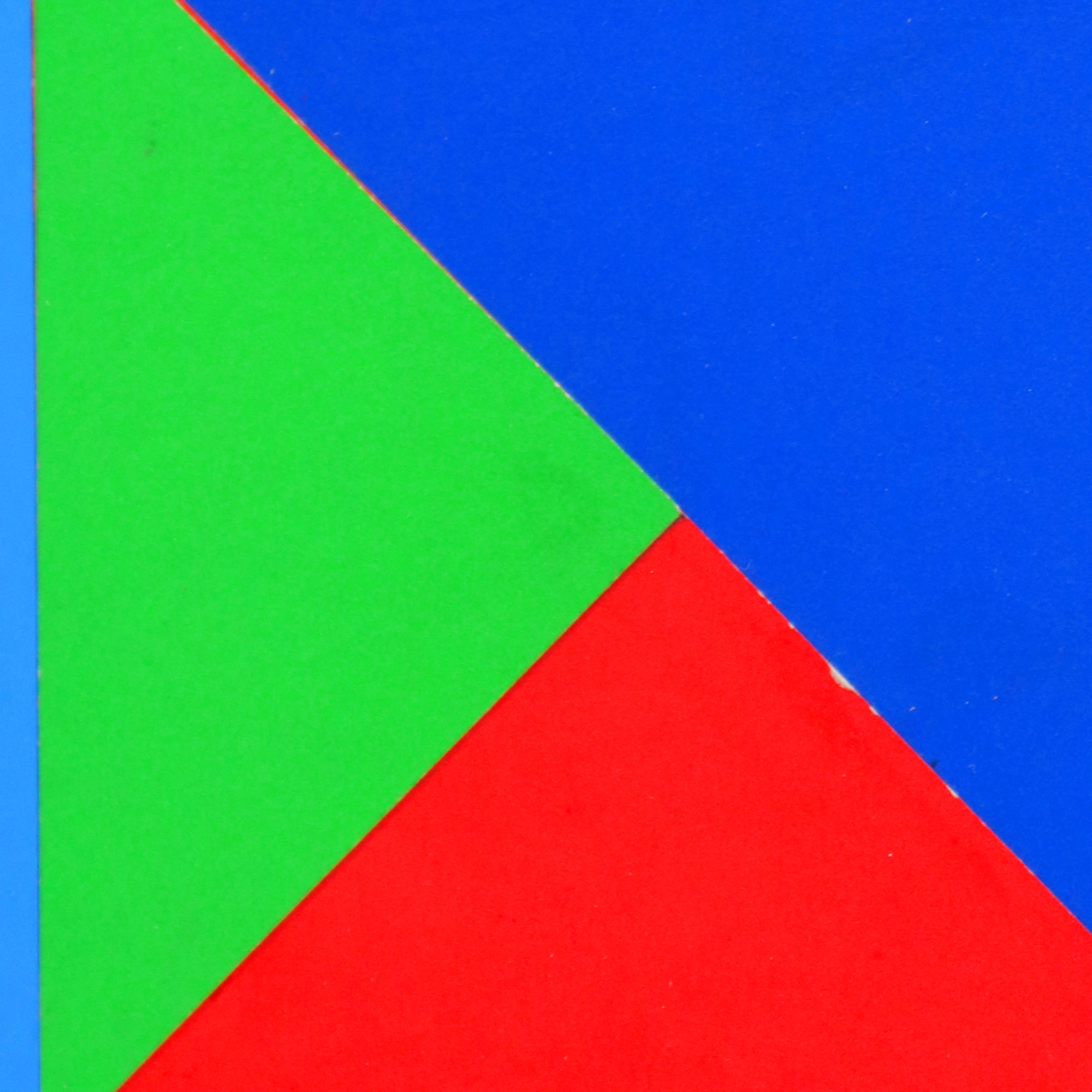 Three compositions on a blue square