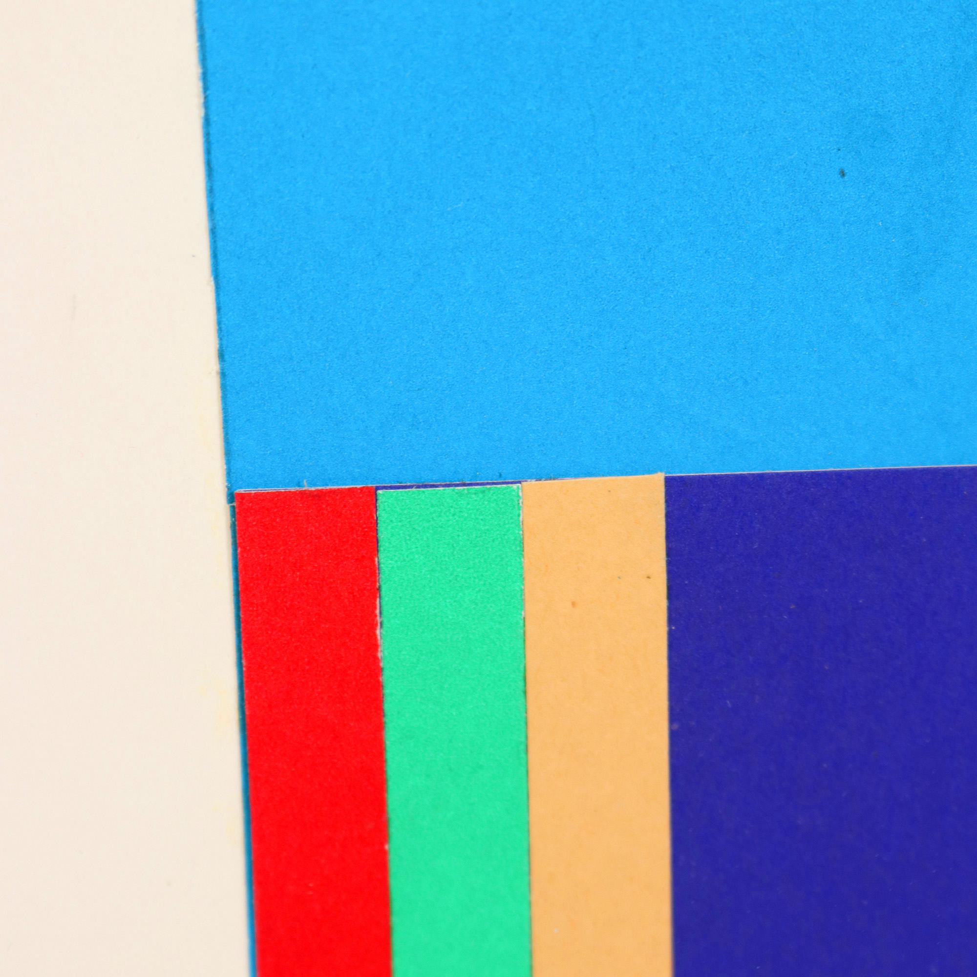 Three compositions on a blue square